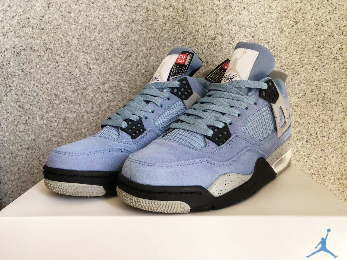 Jordan 4 Retro University Blue Sneakers