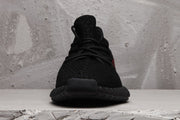 Yeezy Boost 350 V2 Black Knit Sneakers with Red Accents